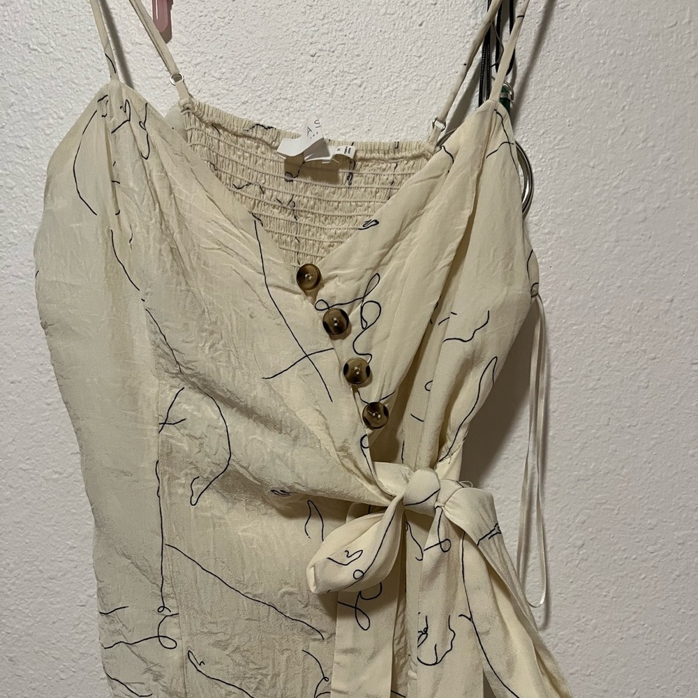 Super cute wrap tank top, brand is known for quality!